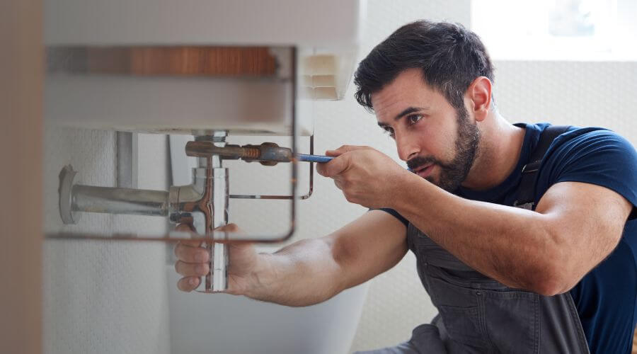 Garbage disposal repair in Log Lane Village, CO
